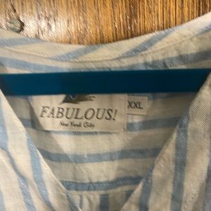 Blue and white sleeveless blouse